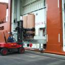 Side loaders: This latest system of loading is done by elevators. This way the cargo hatches can stay closed during loading. This way loading can continue during rain or snow while the paper inside the ship stays dry.