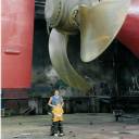 The Propellor: The m.v.Spaarnegracht in the drydock in Rotterdam. My wife(Irene) and daughter(Nanouchka) in front on the dockfloor.