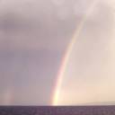 Rainbow off Mexico: The Captain decided to give the passengers a show and went along the coast. He got a bonus when a small squall gave us this scene.