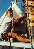 Lashing on new sails July 1991 Tribune Bay